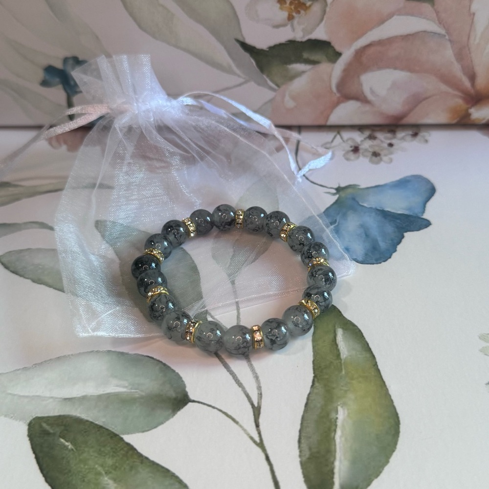 Elegant Gray Beaded Bracelet with Gold Accents